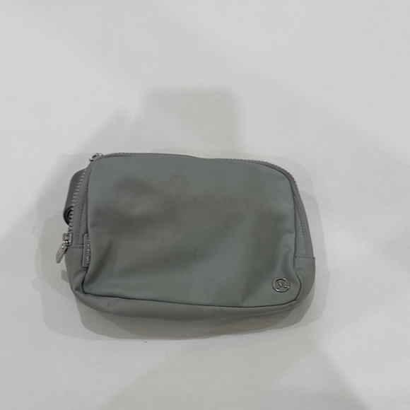 lululemon athletica Handbags - Big Lululemon Athletica Gray Toiletry Bag not Stained just needs to be cleaned:)